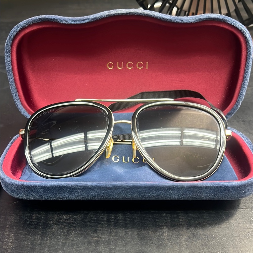 Gucci Black and Gold Sunglasses